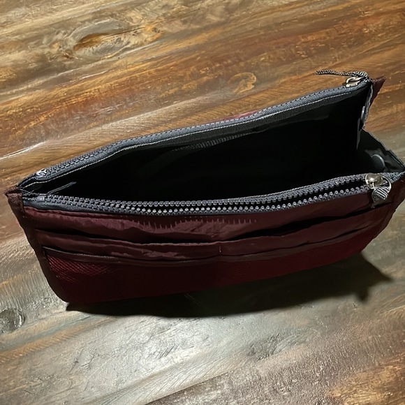 Travel maroon toiletry bag. 10” long by 6” tall. - Picture 3 of 9